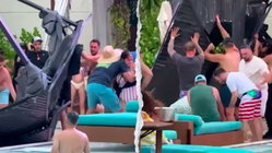 Terrifying scene unfolds as metal cabana frame crashes into packed casino pool area Melbourne School